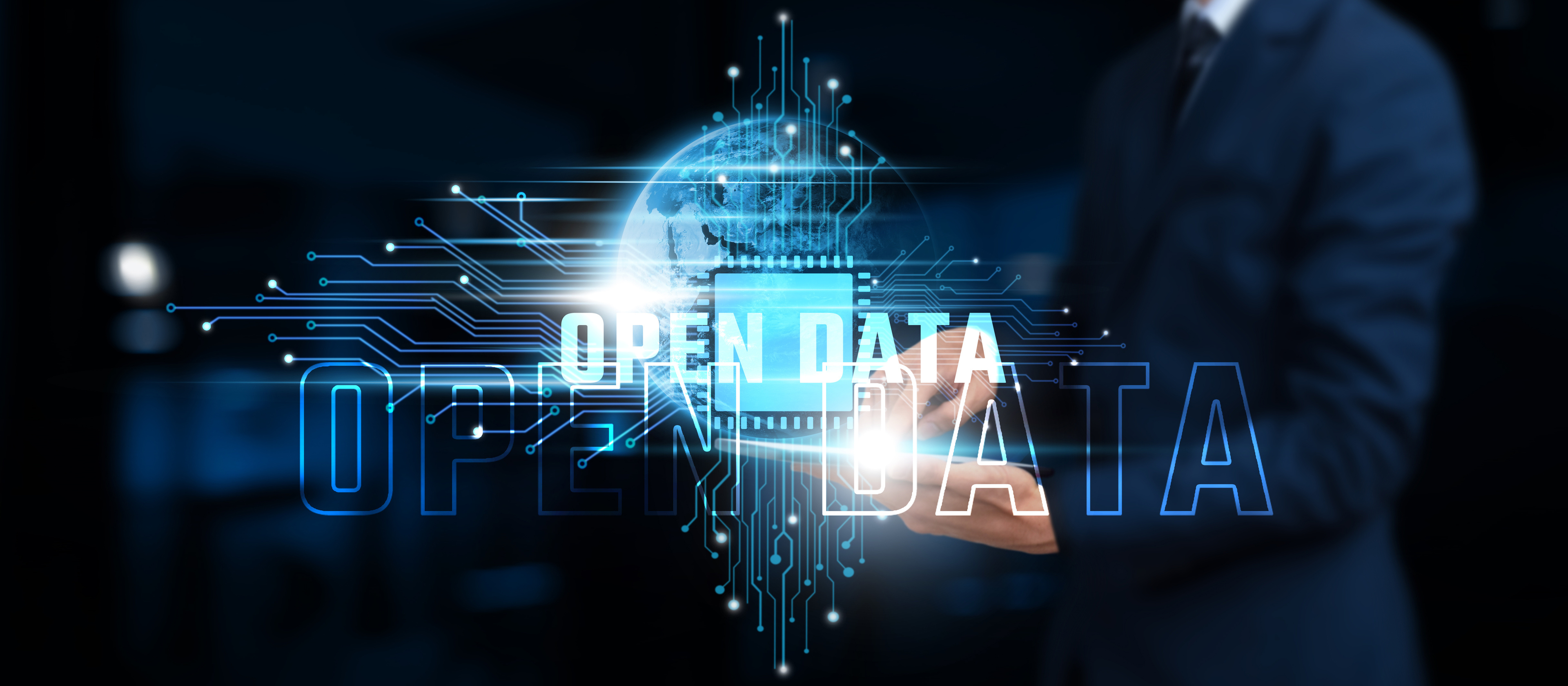 man in dark background with the words "open data" floating with blue lines and illustrations